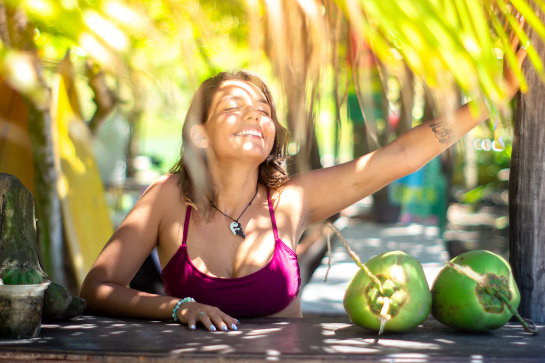 A happy girl with coconuts